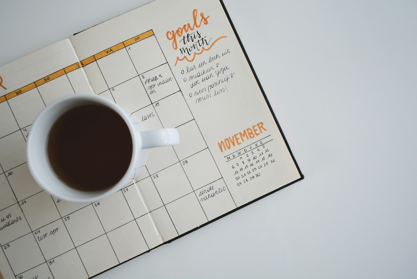 Calendar and planning notebook on a desk