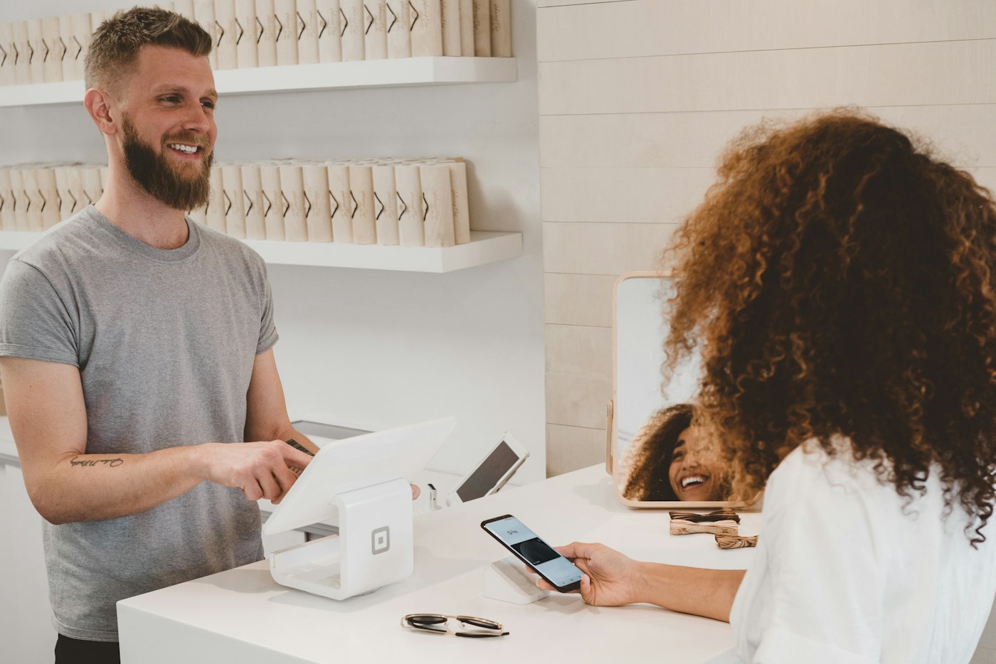 Owner taking a card payment for an invoice
